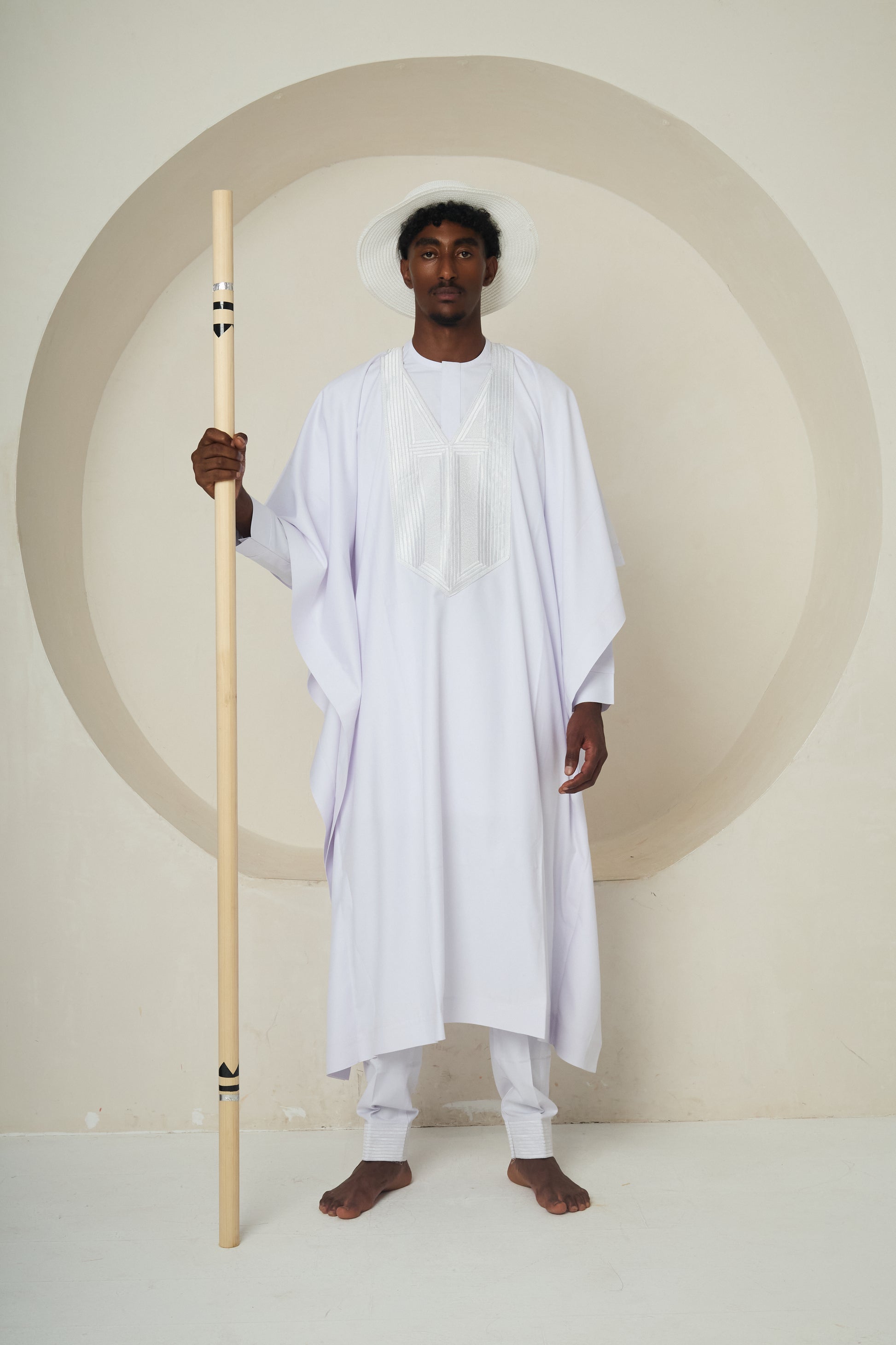 WALKING LINEAGE (Drape Robe with Color-Tipped Staff and Akete Crown)