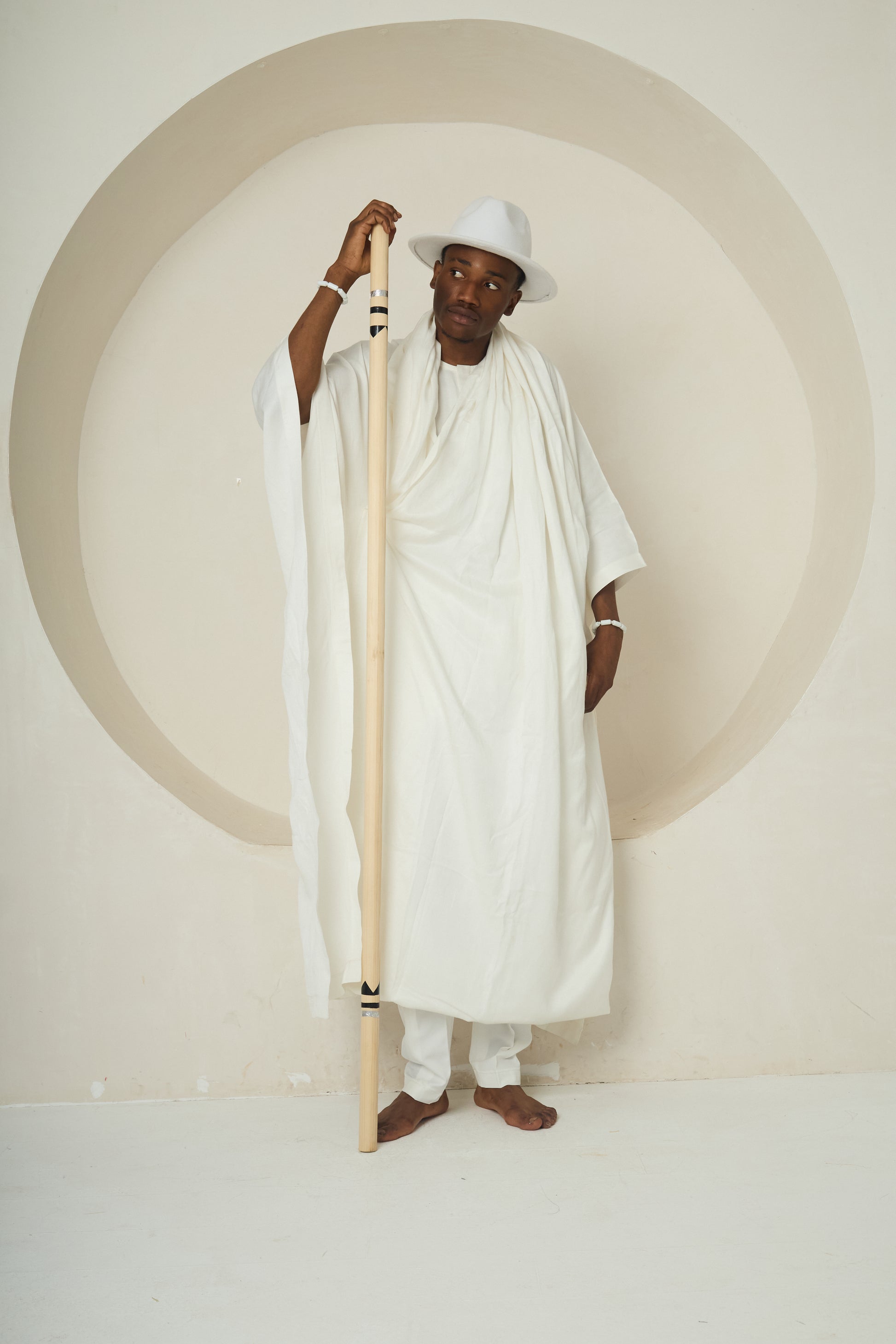 WALKING LINEAGE (Drape Robe with Color-Tipped Staff and Akete Crown)
